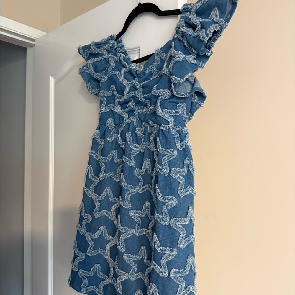 Size 10, heavy jean feel, look for Mommy and Me dress.